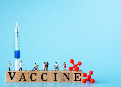 miniature-doctor-patient-wear-mask-prevent-virus-red-virus-with-wooden-cubes-with-words-vaccine-syringe_44680-242